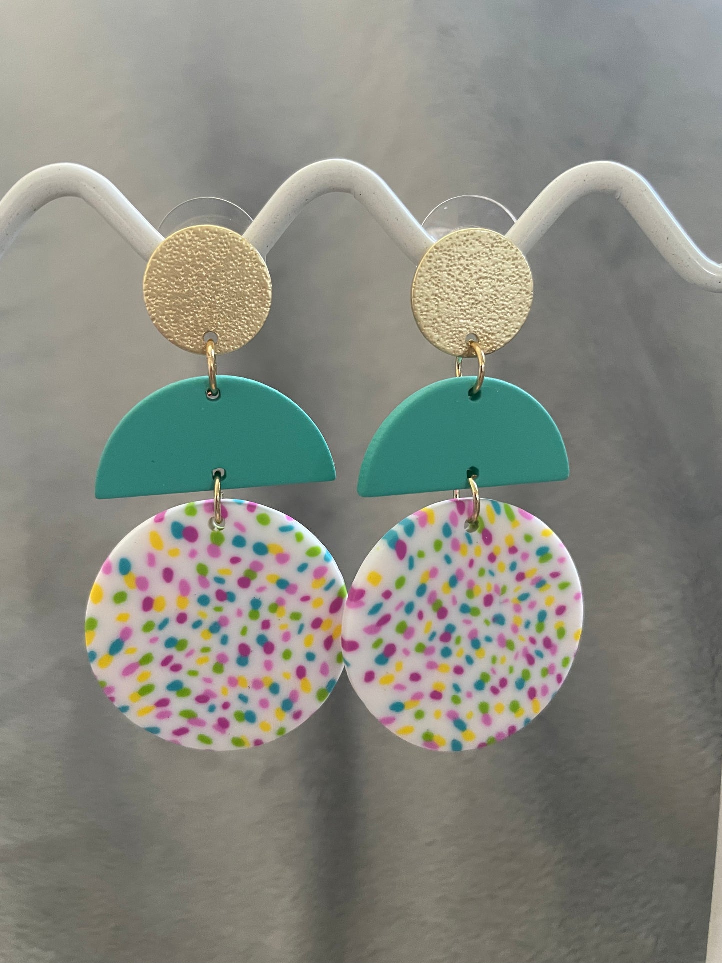 Teal, gold and rainbows