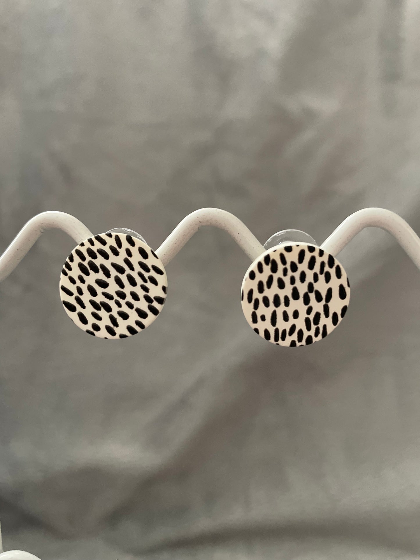 Black and white round studs