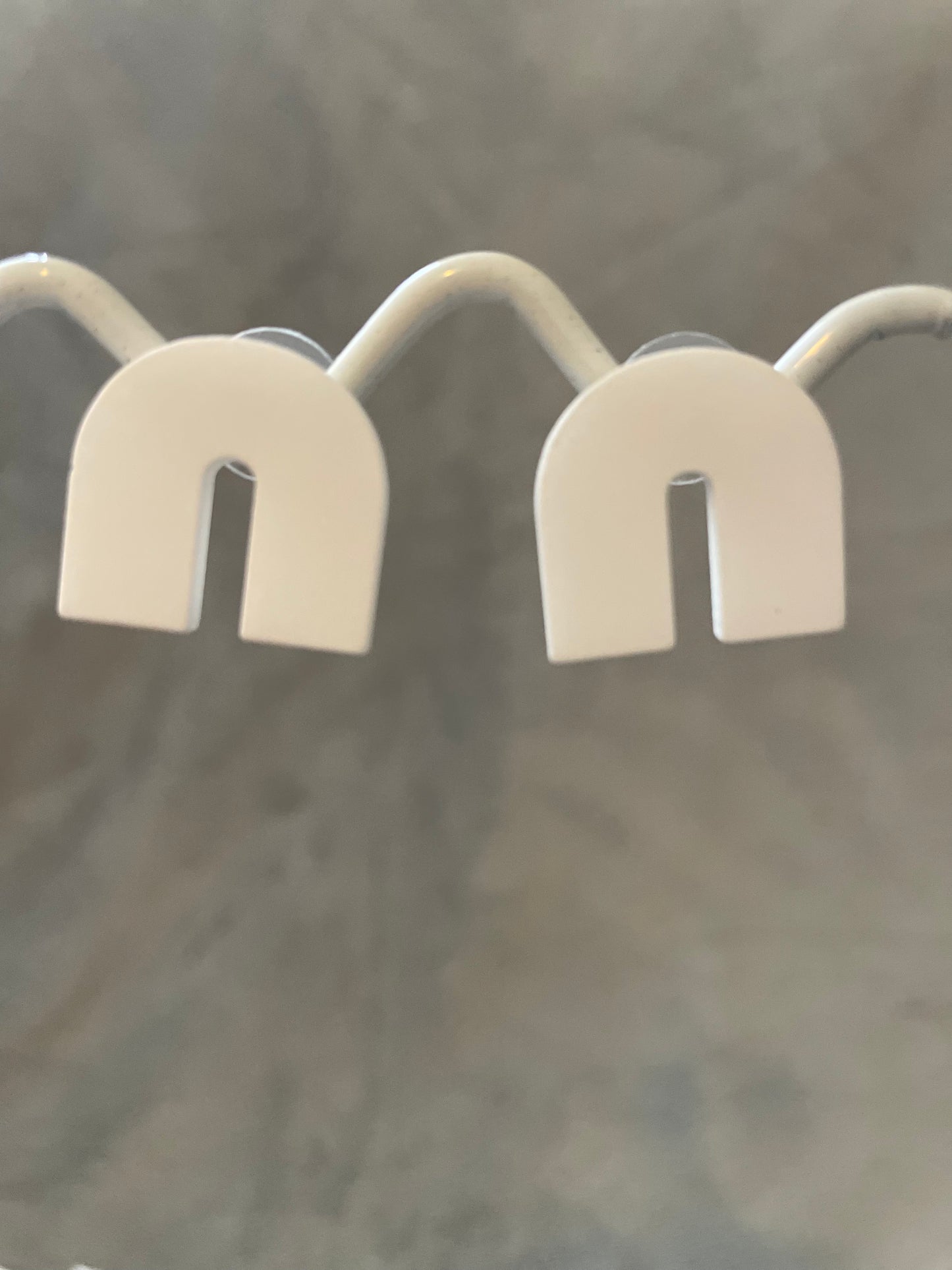 White arch studs