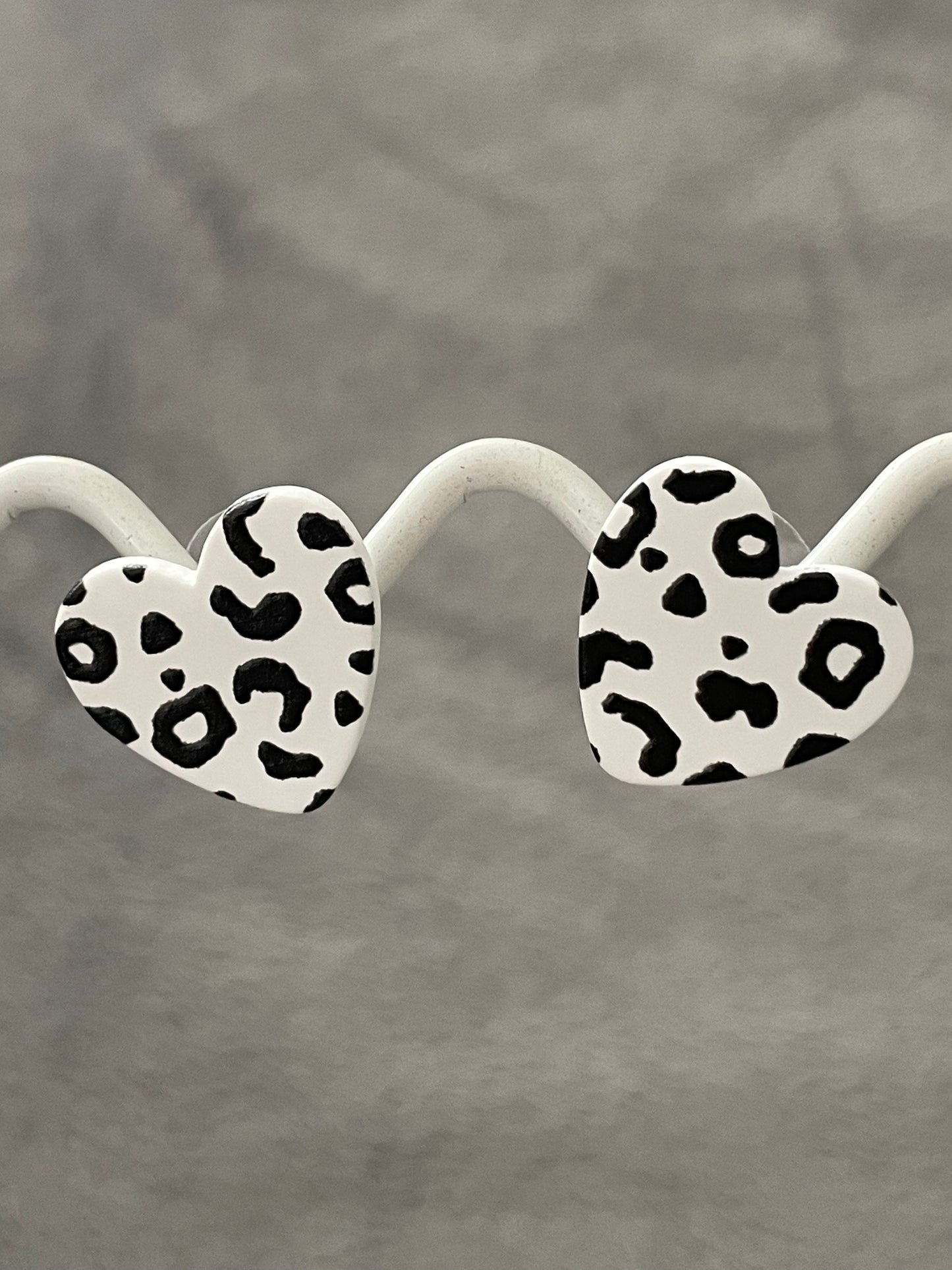 Black and white heart studs