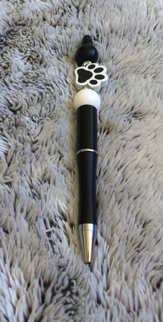 Black and white paw print pen