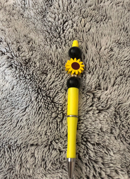 Yellow and black sunflower pen