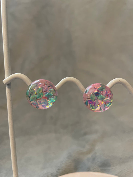 Pink and green round studs