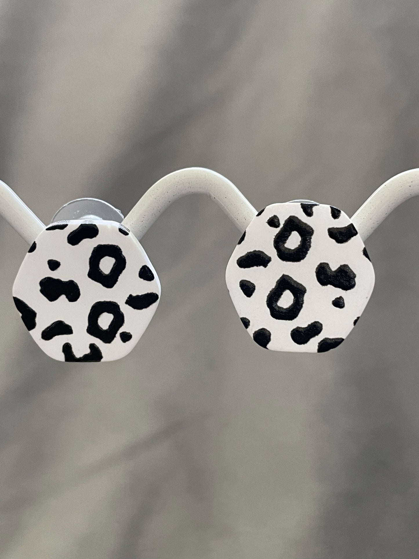 Hexagonal cow print studs