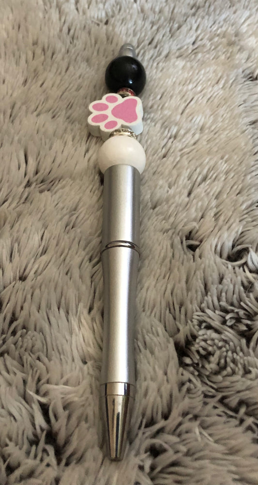 Pink and white paw print